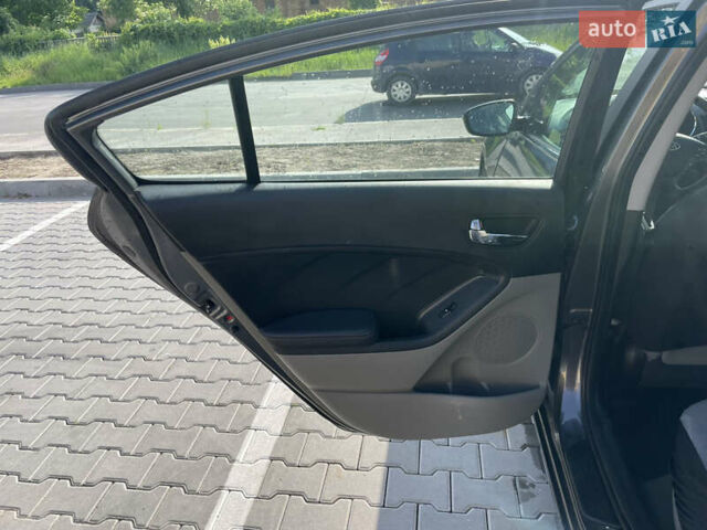 Серый Киа Форте, объемом двигателя 2 л и пробегом 160 тыс. км за 7200 $, фото 20 на Automoto.ua