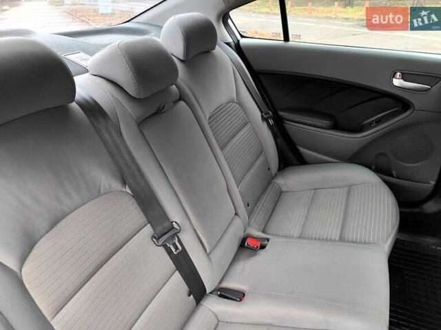 Серый Киа Форте, объемом двигателя 2 л и пробегом 257 тыс. км за 6990 $, фото 54 на Automoto.ua
