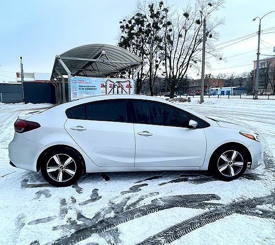 Серый Киа Форте, объемом двигателя 2 л и пробегом 115 тыс. км за 11000 $, фото 1 на Automoto.ua