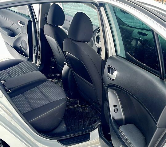 Серый Киа Форте, объемом двигателя 2 л и пробегом 115 тыс. км за 11000 $, фото 10 на Automoto.ua