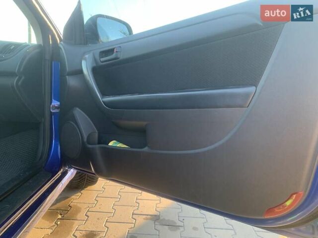 Синий Киа Форте, объемом двигателя 2 л и пробегом 260 тыс. км за 7999 $, фото 2 на Automoto.ua