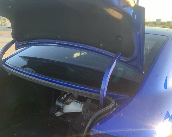 Синий Киа Форте, объемом двигателя 2 л и пробегом 260 тыс. км за 7999 $, фото 5 на Automoto.ua