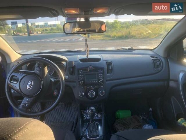 Синий Киа Форте, объемом двигателя 2 л и пробегом 260 тыс. км за 7999 $, фото 9 на Automoto.ua