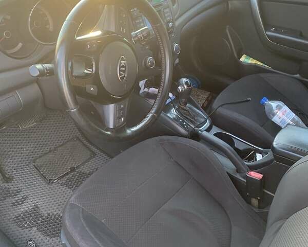 Синий Киа Форте, объемом двигателя 2 л и пробегом 260 тыс. км за 7999 $, фото 11 на Automoto.ua