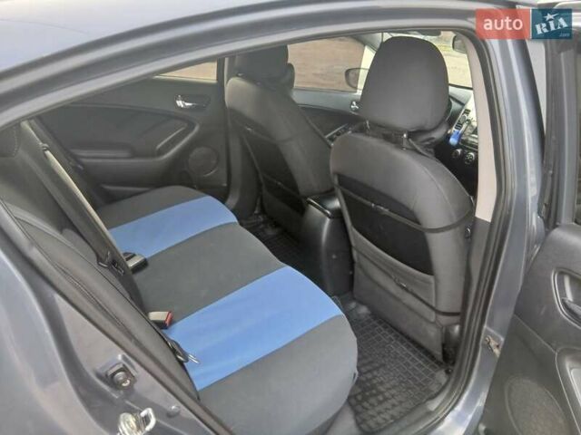 Синий Киа Форте, объемом двигателя 1.8 л и пробегом 307 тыс. км за 6900 $, фото 19 на Automoto.ua