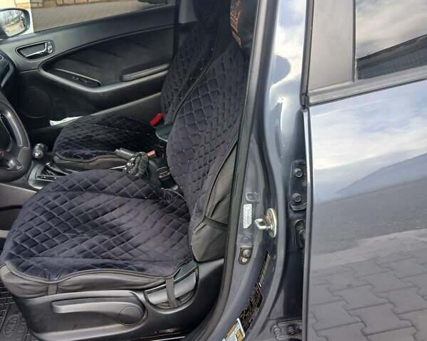 Синий Киа Форте, объемом двигателя 1.8 л и пробегом 307 тыс. км за 6900 $, фото 59 на Automoto.ua
