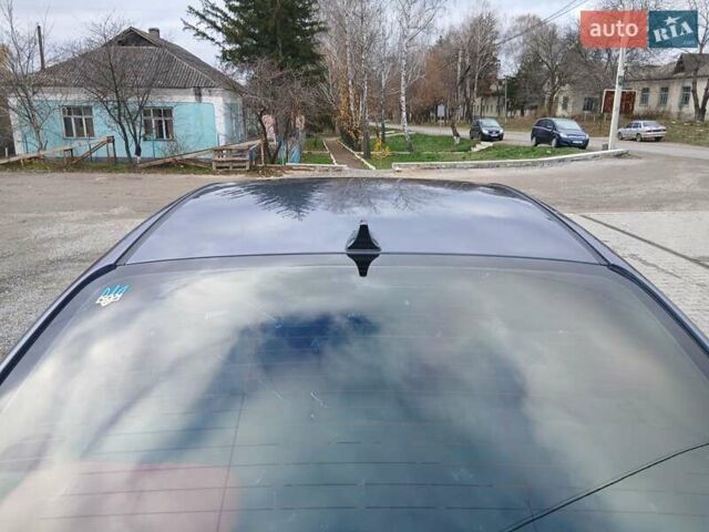 Синий Киа Форте, объемом двигателя 1.8 л и пробегом 307 тыс. км за 6900 $, фото 1 на Automoto.ua