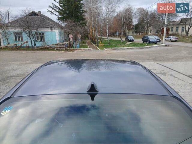 Синий Киа Форте, объемом двигателя 1.8 л и пробегом 307 тыс. км за 6900 $, фото 10 на Automoto.ua