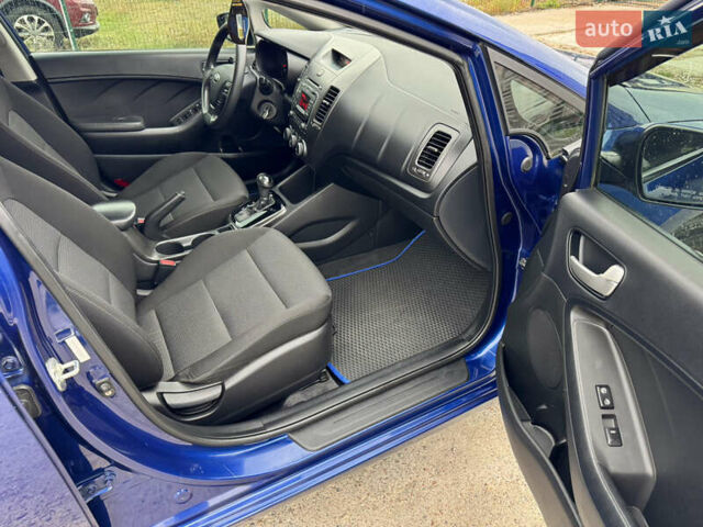 Синий Киа Форте, объемом двигателя 2 л и пробегом 179 тыс. км за 9700 $, фото 26 на Automoto.ua