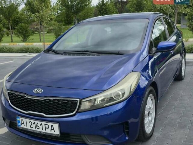 Синий Киа Форте, объемом двигателя 2 л и пробегом 186 тыс. км за 9000 $, фото 2 на Automoto.ua