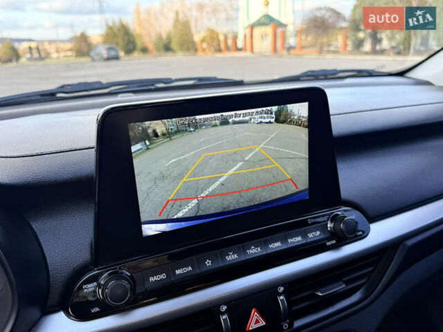 Синій Кіа Форте, об'ємом двигуна 2 л та пробігом 84 тис. км за 13700 $, фото 25 на Automoto.ua