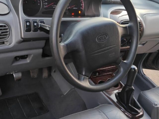 Черный Киа Джойс, объемом двигателя 2 л и пробегом 200 тыс. км за 2800 $, фото 20 на Automoto.ua