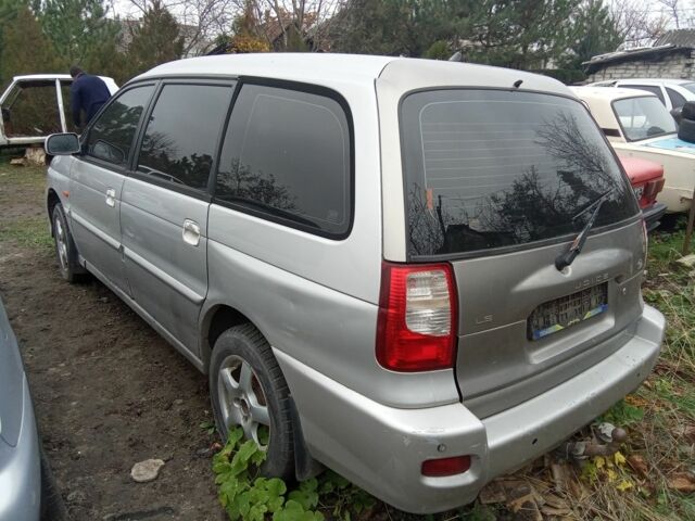 Серый Киа Джойс, объемом двигателя 2 л и пробегом 150 тыс. км за 1600 $, фото 1 на Automoto.ua