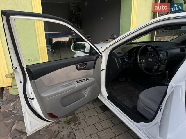 Белый Киа Маджентис, объемом двигателя 2 л и пробегом 162 тыс. км за 6700 $, фото 16 на Automoto.ua