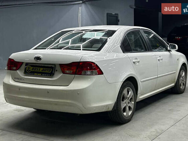 Білий Кіа Маджентіс, об'ємом двигуна 2 л та пробігом 163 тис. км за 6800 $, фото 5 на Automoto.ua