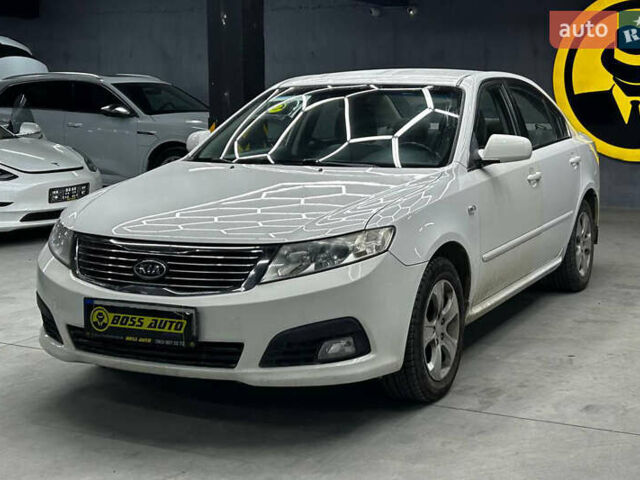 Білий Кіа Маджентіс, об'ємом двигуна 2 л та пробігом 163 тис. км за 6800 $, фото 2 на Automoto.ua