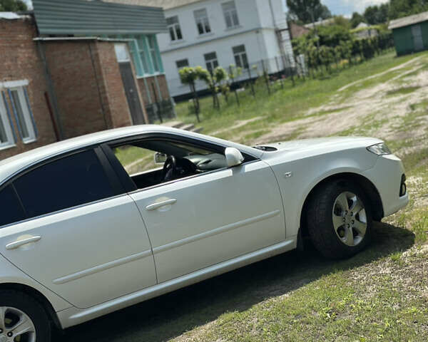 Белый Киа Маджентис, объемом двигателя 2 л и пробегом 195 тыс. км за 7450 $, фото 6 на Automoto.ua