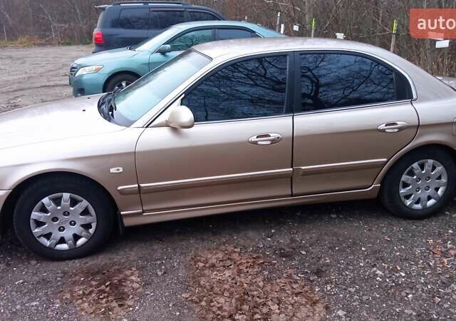 Бежевый Киа Маджентис, объемом двигателя 2 л и пробегом 135 тыс. км за 5500 $, фото 1 на Automoto.ua