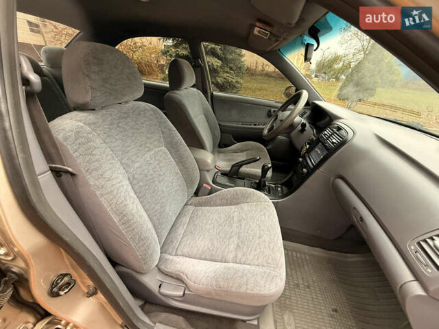 Бежевий Кіа Маджентіс, об'ємом двигуна 2 л та пробігом 165 тис. км за 3900 $, фото 14 на Automoto.ua