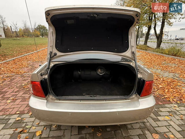 Бежевий Кіа Маджентіс, об'ємом двигуна 2 л та пробігом 165 тис. км за 3900 $, фото 24 на Automoto.ua