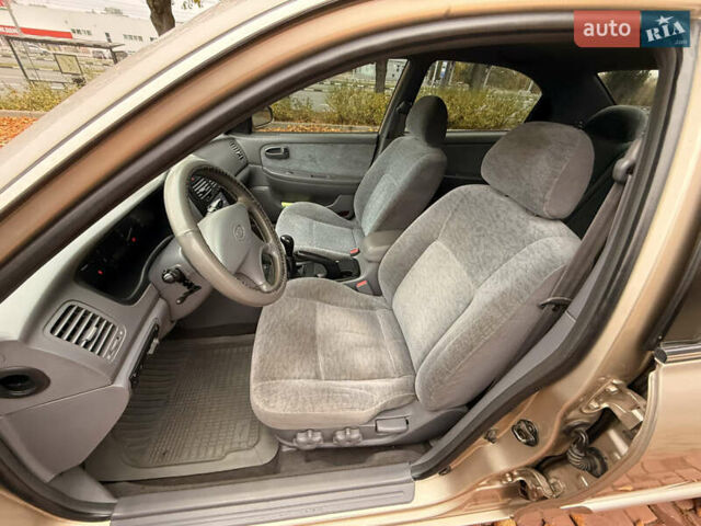 Бежевий Кіа Маджентіс, об'ємом двигуна 2 л та пробігом 165 тис. км за 3900 $, фото 22 на Automoto.ua