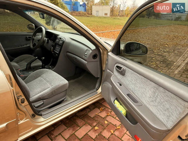 Бежевий Кіа Маджентіс, об'ємом двигуна 2 л та пробігом 165 тис. км за 3900 $, фото 17 на Automoto.ua