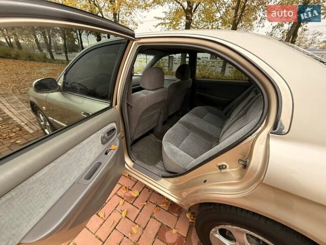 Бежевий Кіа Маджентіс, об'ємом двигуна 2 л та пробігом 165 тис. км за 3900 $, фото 16 на Automoto.ua