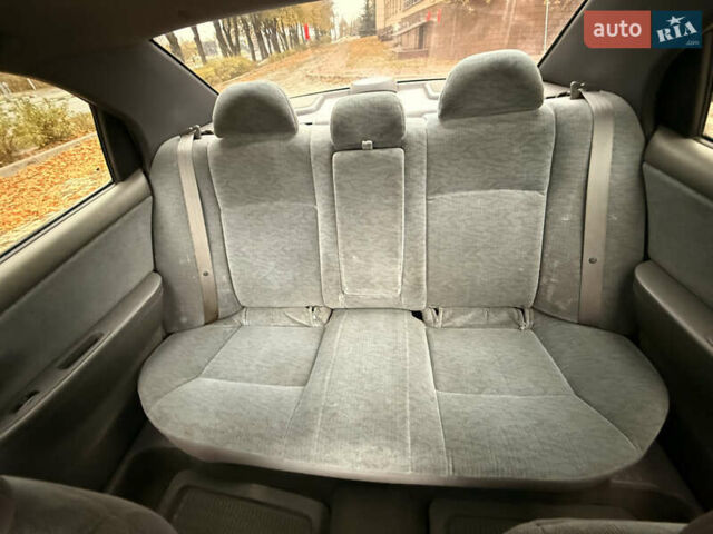 Бежевий Кіа Маджентіс, об'ємом двигуна 2 л та пробігом 165 тис. км за 3900 $, фото 23 на Automoto.ua