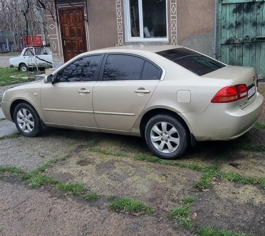 Бежевый Киа Маджентис, объемом двигателя 2 л и пробегом 280 тыс. км за 3500 $, фото 2 на Automoto.ua