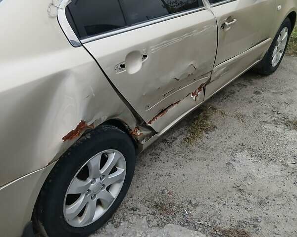 Бежевий Кіа Маджентіс, об'ємом двигуна 2 л та пробігом 280 тис. км за 2700 $, фото 9 на Automoto.ua