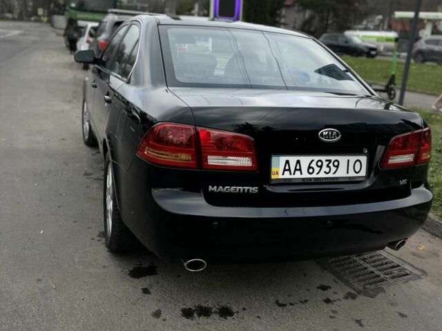 Чорний Кіа Маджентіс, об'ємом двигуна 2 л та пробігом 280 тис. км за 6450 $, фото 16 на Automoto.ua