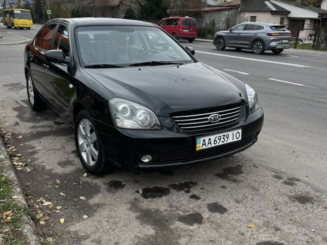 Чорний Кіа Маджентіс, об'ємом двигуна 2 л та пробігом 280 тис. км за 6450 $, фото 2 на Automoto.ua