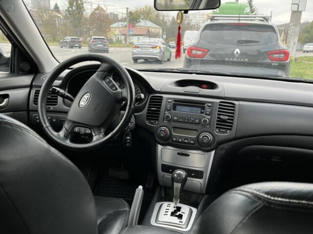 Чорний Кіа Маджентіс, об'ємом двигуна 2 л та пробігом 280 тис. км за 6450 $, фото 14 на Automoto.ua