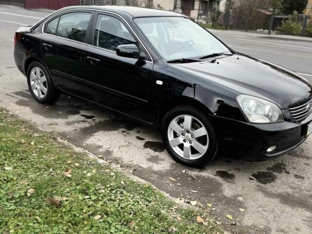 Чорний Кіа Маджентіс, об'ємом двигуна 2 л та пробігом 280 тис. км за 6450 $, фото 1 на Automoto.ua