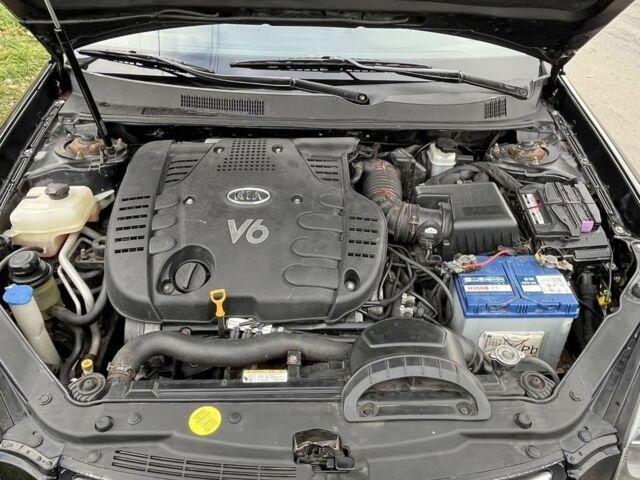 Чорний Кіа Маджентіс, об'ємом двигуна 2 л та пробігом 280 тис. км за 6450 $, фото 3 на Automoto.ua