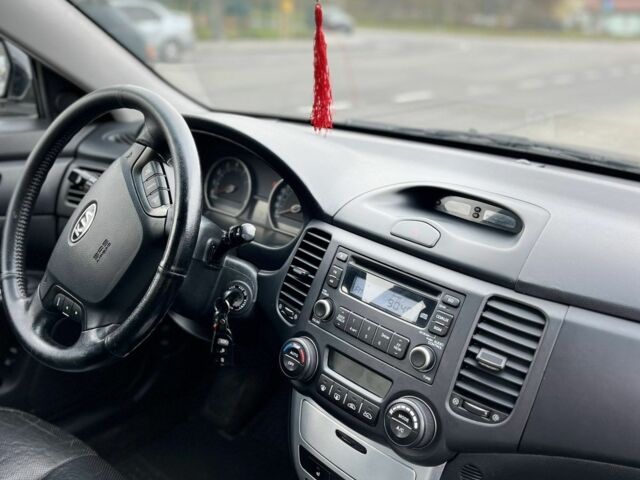 Чорний Кіа Маджентіс, об'ємом двигуна 2 л та пробігом 280 тис. км за 6450 $, фото 12 на Automoto.ua