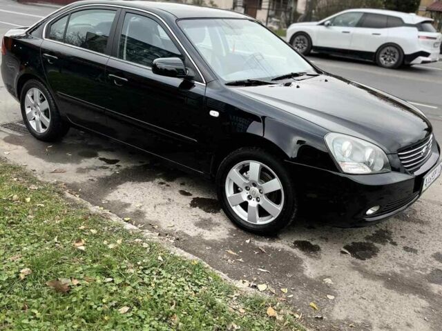 Чорний Кіа Маджентіс, об'ємом двигуна 2 л та пробігом 280 тис. км за 6450 $, фото 13 на Automoto.ua