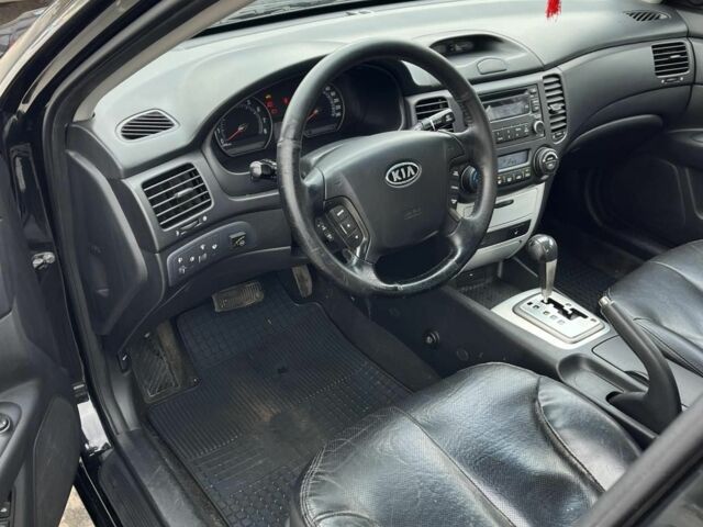 Чорний Кіа Маджентіс, об'ємом двигуна 2 л та пробігом 280 тис. км за 6450 $, фото 6 на Automoto.ua