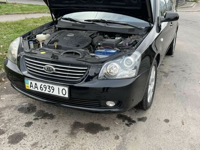 Чорний Кіа Маджентіс, об'ємом двигуна 2 л та пробігом 280 тис. км за 6450 $, фото 20 на Automoto.ua