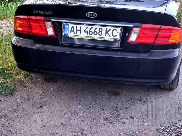 Черный Киа Маджентис, объемом двигателя 2 л и пробегом 190 тыс. км за 4500 $, фото 2 на Automoto.ua