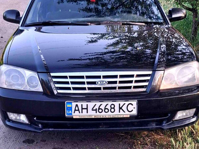 Черный Киа Маджентис, объемом двигателя 2 л и пробегом 190 тыс. км за 4500 $, фото 1 на Automoto.ua