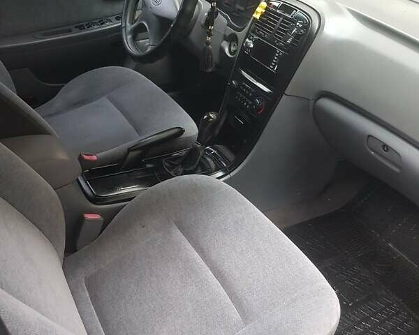 Киа Маджентис 2004 в Белой Церкве на Automoto.ua Черный Киа Маджентис, объемом двигателя 2 л и пробегом 200 тыс. км за 3000 $, фото 3 на Automoto.ua