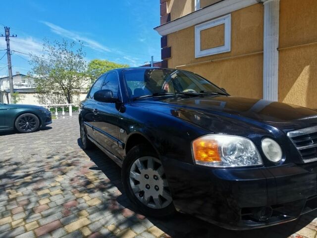 Чорний Кіа Маджентіс, об'ємом двигуна 2 л та пробігом 319 тис. км за 2500 $, фото 2 на Automoto.ua