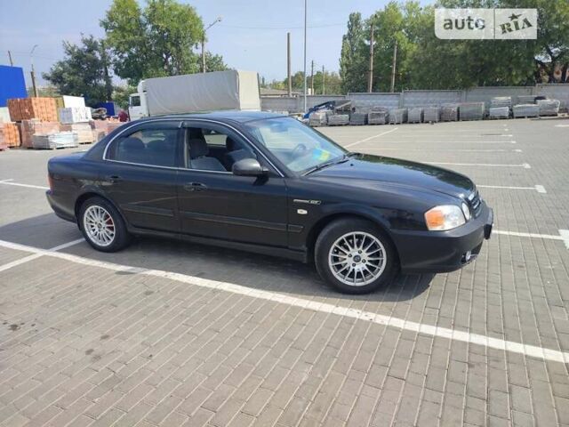 Черный Киа Маджентис, объемом двигателя 2 л и пробегом 245 тыс. км за 3700 $, фото 5 на Automoto.ua