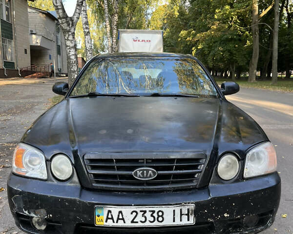 Черный Киа Маджентис, объемом двигателя 2 л и пробегом 455 тыс. км за 2800 $, фото 1 на Automoto.ua