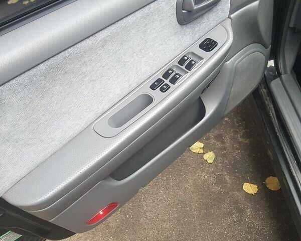 Киа Маджентис 2004 в Белой Церкве на Automoto.ua Черный Киа Маджентис, объемом двигателя 2 л и пробегом 200 тыс. км за 3000 $, фото 5 на Automoto.ua