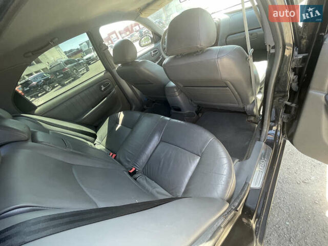 Черный Киа Маджентис, объемом двигателя 2 л и пробегом 350 тыс. км за 2900 $, фото 6 на Automoto.ua