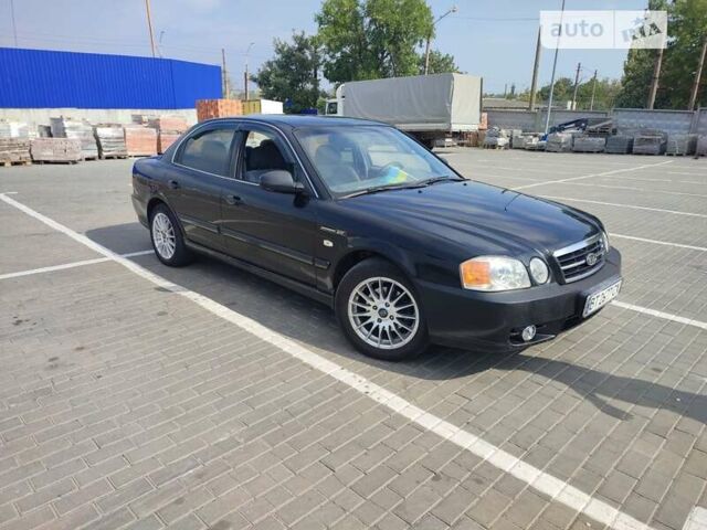 Черный Киа Маджентис, объемом двигателя 2 л и пробегом 245 тыс. км за 3700 $, фото 12 на Automoto.ua