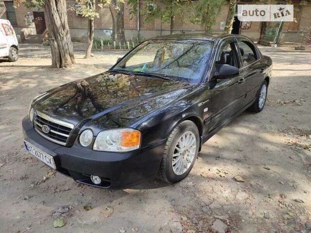 Черный Киа Маджентис, объемом двигателя 2 л и пробегом 245 тыс. км за 3700 $, фото 6 на Automoto.ua