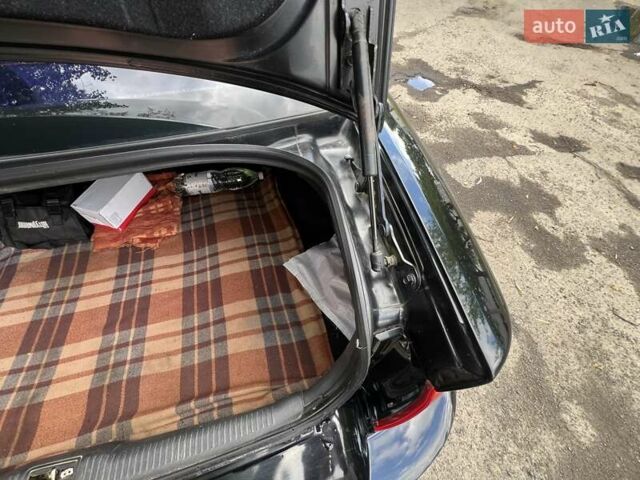 Чорний Кіа Маджентіс, об'ємом двигуна 2 л та пробігом 72 тис. км за 5600 $, фото 29 на Automoto.ua